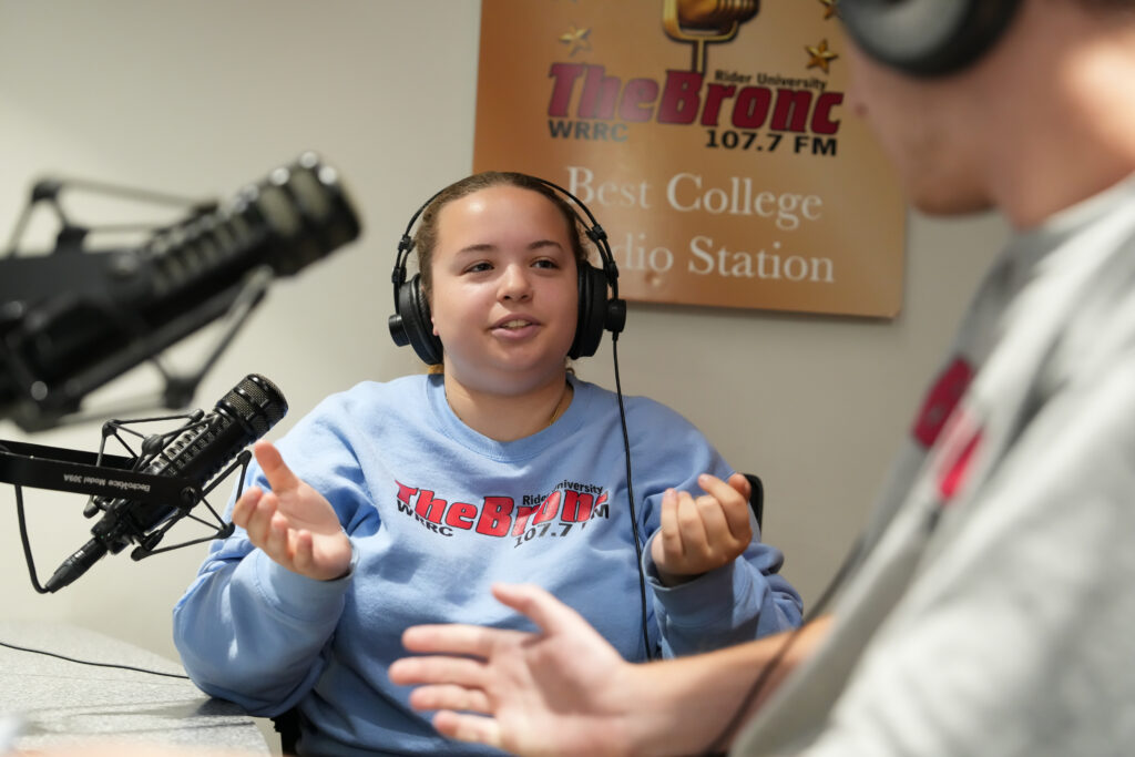 Lindsey recording in the studio
